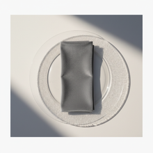 Load image into Gallery viewer, Grey velvet napkin arranged on a plain white plate
