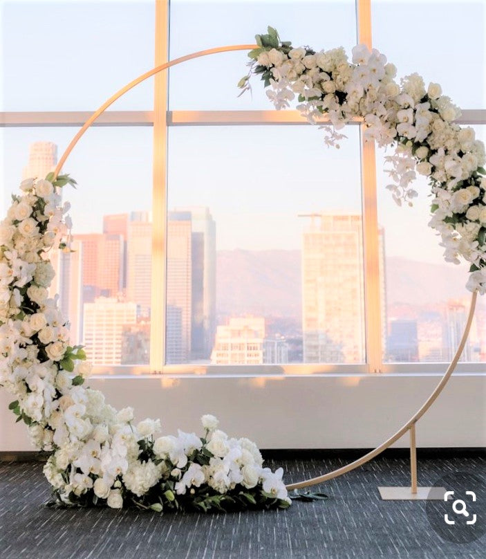 Round metal arch (faux florals included)